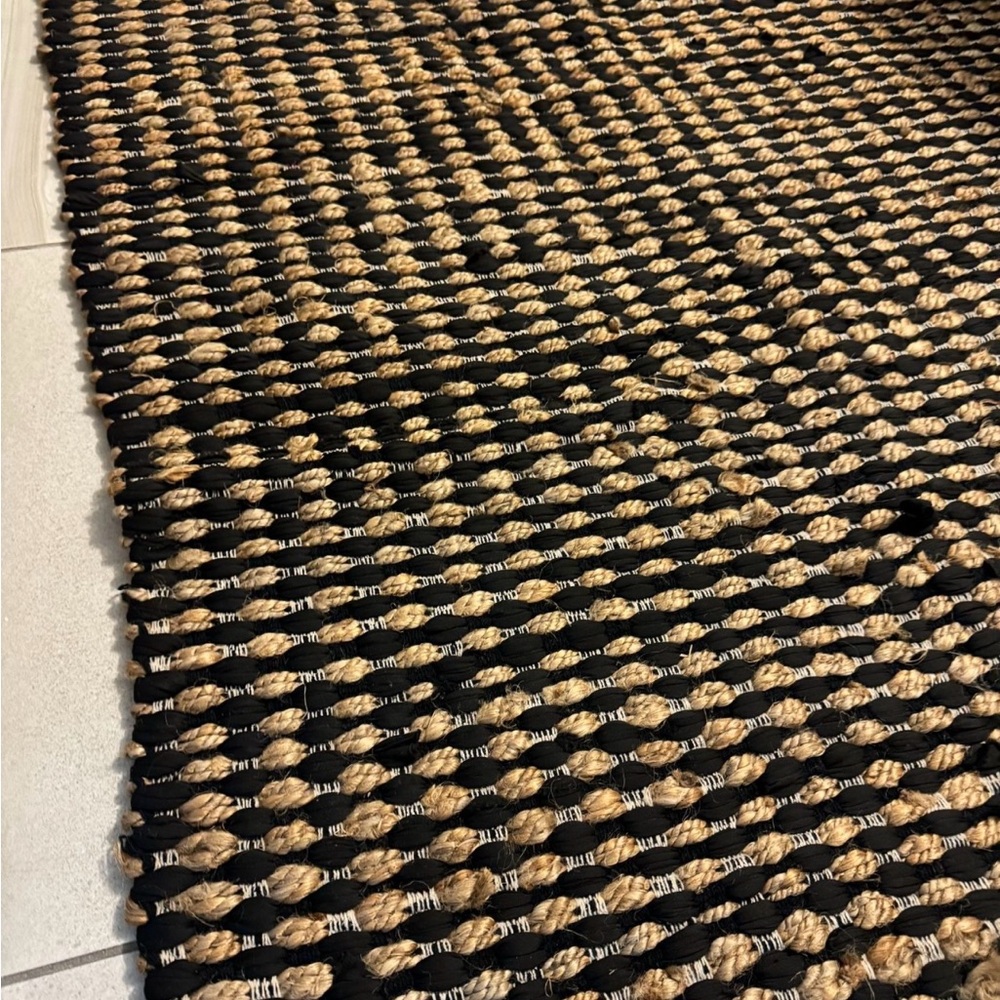 Elegant Black and Tan Woven Rug